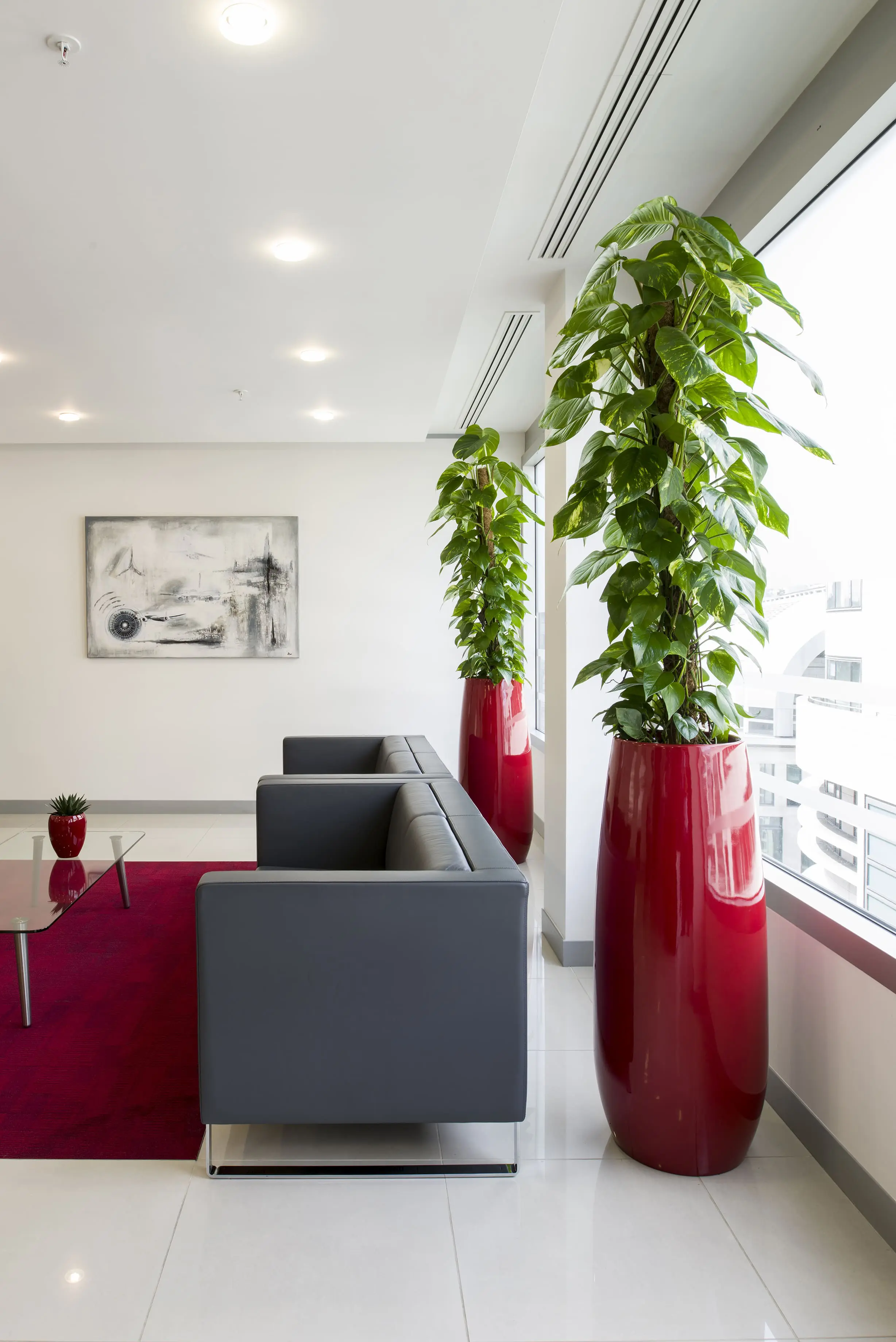 Planters, Containers and Your Office Aesthetic 5 Office with two large red plant pots