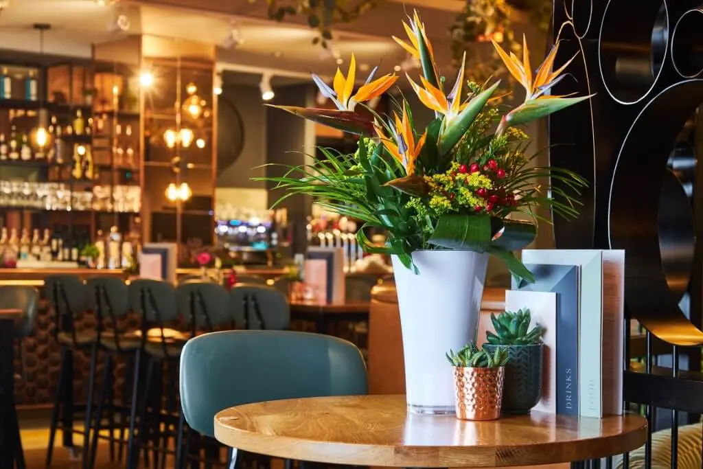 A large display of flowers and vase supplied to a nationwide pub chain.