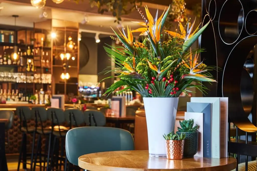 A large display of flowers and vase supplied to a nationwide pub chain.