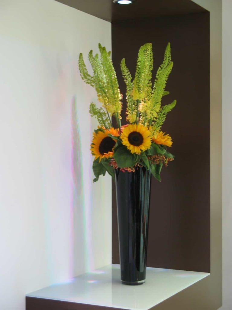 Tall flower display of beautiful sunflowers