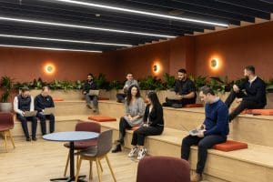 Jll birmingham, a group of team members sitting in the auditorium