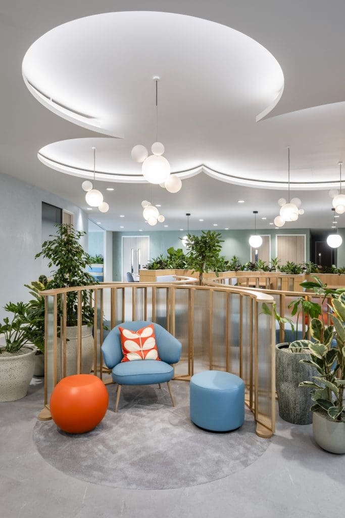 A room with a chair and a round object