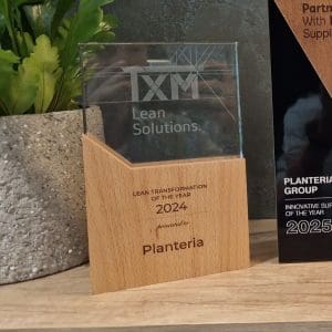 A glass plaque on a shelf