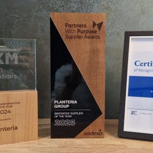 A group of awards on a shelf